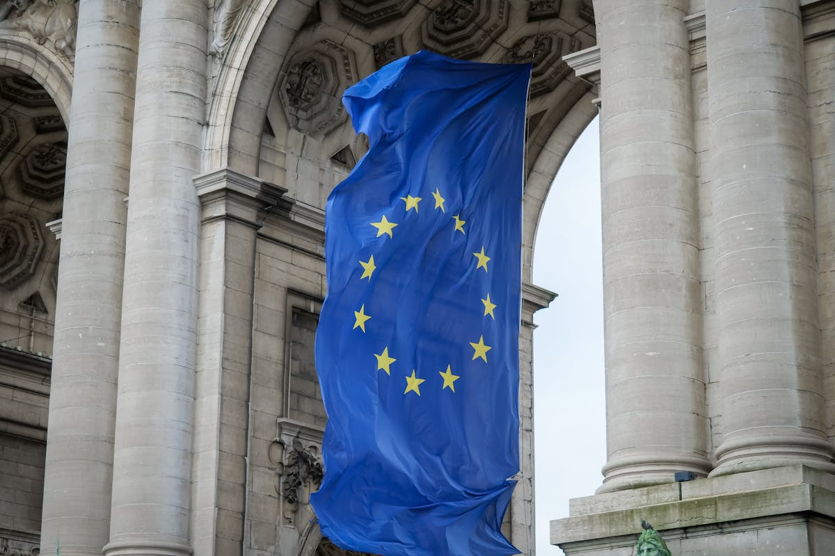 The European Union flag outside an official building